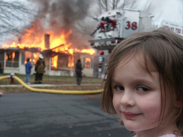 Smiling at fire meme